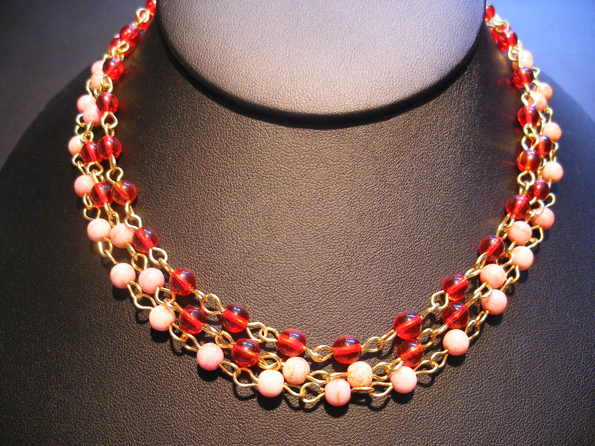 threestrandmarblerednecklace.jpg